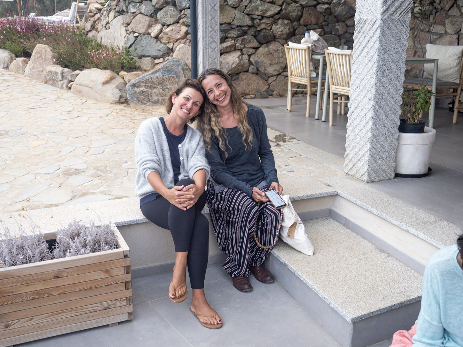 Friends sitting and smiling together